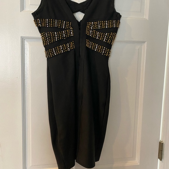 Bandage black dress with gold and diamond details. - Picture 3 of 3